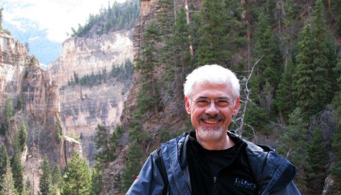 Voice Talent John Drew standing at Hanging Lake in Glenwood Canyon, Colorado.